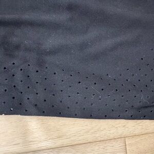 Athleta 7/8 Crop Black Laser cut leggings size 8